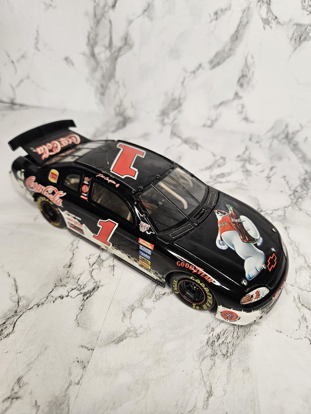1:24 scale diecast replica of the #1 Coca-Cola Polar Bear Chevrolet Monte Carlo